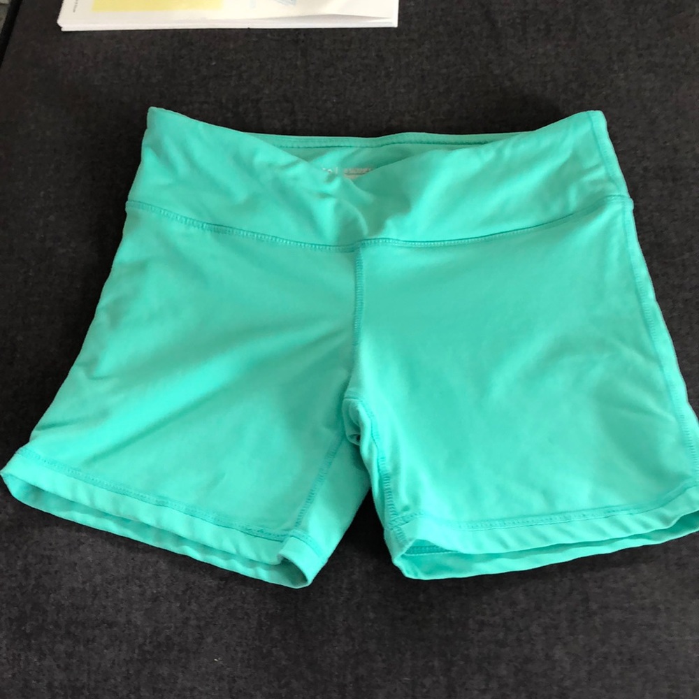 Mint workout compression shorts. Brand is IAB mfg